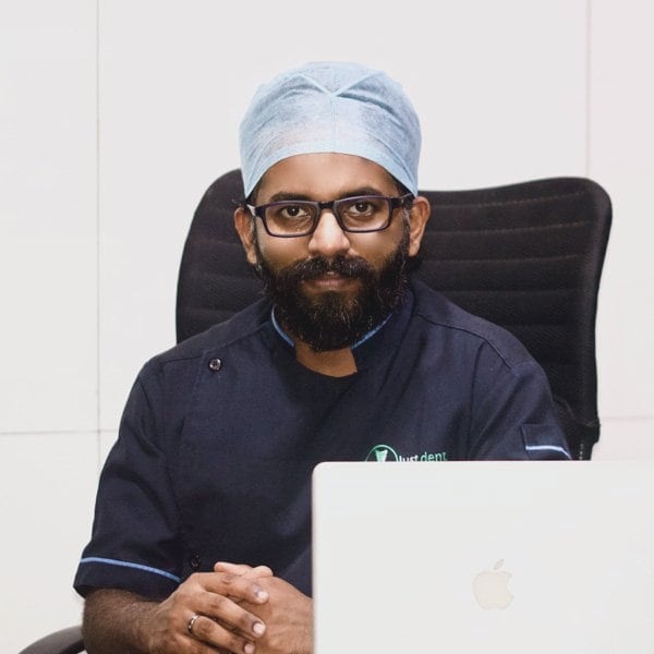 Portrait of Dr. Vaseem, Periodontist & Implantologist at Just Dent